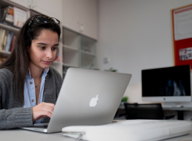 image of lady on apple laptop